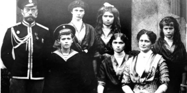 This undated photo shows Czar Nicholas II of Russia, far left, and his family. The remains of the czar and his wife were exhumed Wednesday, Sept. 23, 2015 in an effort to identify the remains of two of their children. (Reuters/File)
