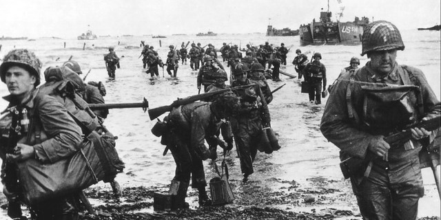 U.S. reinforcements land on Omaha beach during the Normandy D-Day landings near Vierville sur Mer, France, on June 6, 1944.