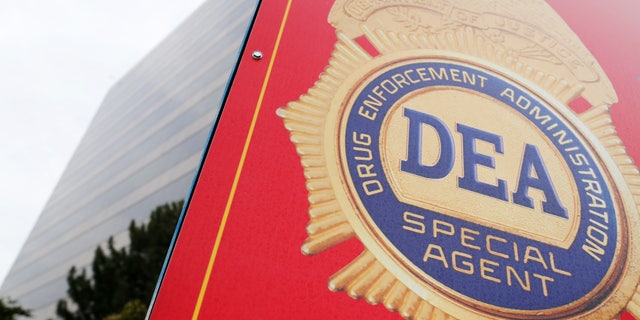 A sign with a DEA badge marks the entrance to the U.S. Drug Enforcement Administration Museum in Arlington, Virginia.