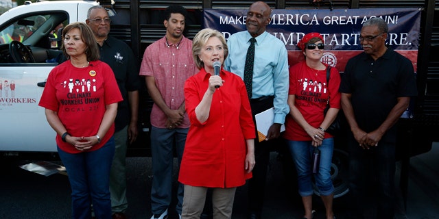 Oct. 12, 2015: Democratic presidential candidate Hillary Rodham Clinton speaks during a rally in Las Vegas, held by the Culinary Union to support a union drive at the Trump Hotel in Las Vegas. (AP Photo/John Locher)