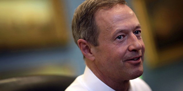 File- This April 7, 2014, file photo shows Maryland Gov. Martin O'Malley speaking with reporters in his office inside the Maryland State House in Annapolis, Md. (AP Photo/Patrick Semansky, File)