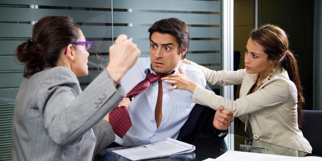 Office life: business team having a fight