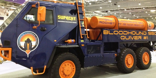Supacat's six-wheeled "Quiver" support vehicle carries spare rockets for the supersonic speed team.