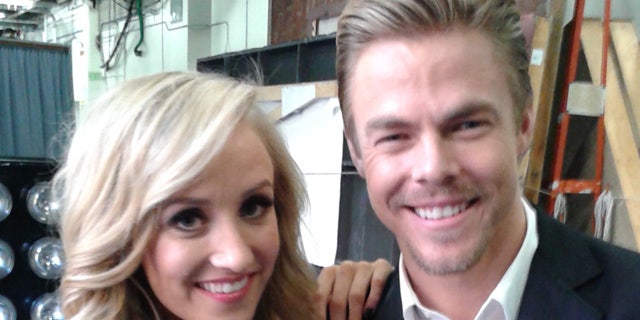 May 12, 2015: Nastia Liukin poses with partner Derek Hough after the pair were eliminated from 'Dancing With The Stars'. (Carole Glines)