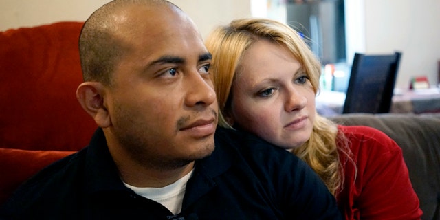 Officer Jorge Barrientos with his girlfriend, Bethany Knutson, Sunday, July 10, 2016, in Dallas.