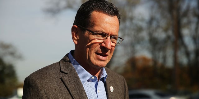 BRIDGEPORT, CT - NOVEMBER 04: Democratic Connecticut Governor Dan Malloy stops at a polling station on November 4, 2014 in Bridgeport, Connecticut. Around the country voters are turning out to decide the 2014 midterm elections. In Connecticut voters will decide on whether to keep Democratic Malloy who is currently in a dead heat with Republican Tom Foley. Polls show a tight race in many states with most analysts predicting that the Republicans are on track to make gains and possibly control the U.S. Senate. (Photo by Spencer Platt/Getty Images)