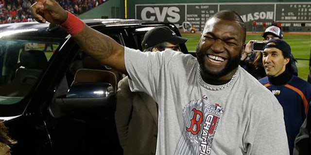 FILE - In this Oct. 31, 2013 file photo, Boston Red Sox designated hitter David Ortiz laughs after being named the MVP after Game 6 of baseball's World Series, in Boston. MTV Networks and Major League Baseball on Monday, Nov. 11, 2013 said they are collaborating on a weekly 30-episode series that melds pop culture and baseball. Ortiz and Pittsburgh Pirates All-Star outfielder Andrew McCutchen are both executive producers of the series, set to begin next spring around the start of the new season. (AP Photo/Matt Slocum, File)
