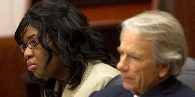 Nov. 12, 2012: In this file photo, home day care operator Jessica Tata, left, and her attorney Mike DeGeurin listen to the closing arguments in her murder trial for the death of 16-month-old day care fire victim, Elias Castillo, at the Harris County Criminal Justice Center, in Houston.