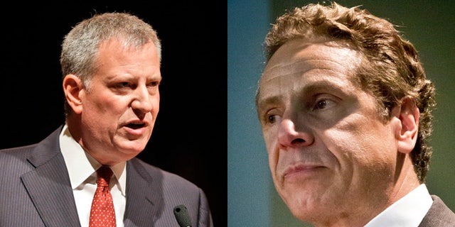 New York Mayor Bill de Blasio (left) and New York Gov. Andrew Cuomo (right).