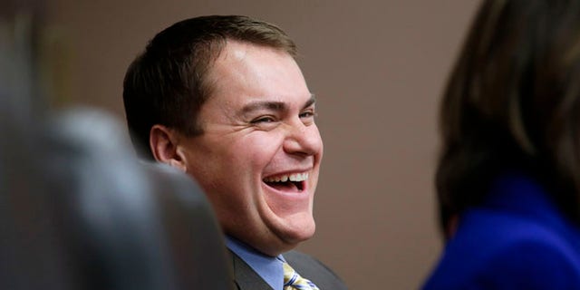 Oct. 10, 2012: Carl DeMaio, now running for Congress, laughs during a City Council meeting in San Diego.