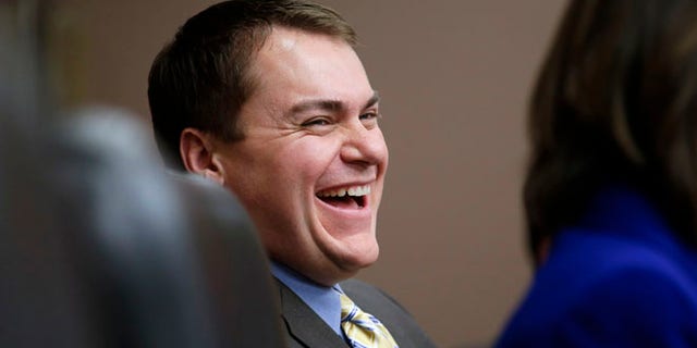 Oct. 10, 2012: Carl DeMaio, now running for Congress, laughs during a City Council meeting in San Diego.