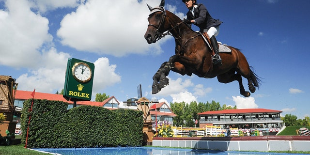 CALGARY, CANADA - SEPTEMBER 08: Andres Rodriguez of Venezuela riding Caballito competes in the individual jumping equestrian on the final day of the Masters tournament at Spruce Meadows on September 8, 2013 in Calgary, Alberta, Canada. Andres placed 18th with a time of 91.49 and 8 faults. (Photo by Derek Leung/Getty Images)