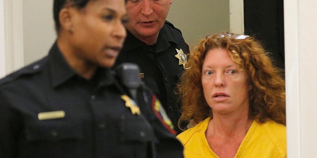 Tonya Couch appears in court in Fort Worth, Texas, Friday, Jan. 8, 2016. The mother of Ethan Couch, who used an "affluenza" defense after killing people in a drunken-driving wreck, appeared in court on a charge of hindering the apprehension of a felon. (Rodger Mallison/Star-Telegram via AP, Pool)