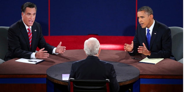 Oct. 22, 2012: Republican presidential nominee Mitt Romney and President Barack Obama answer a question during the third presidential debate at Lynn University, in Boca Raton, Fla.