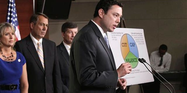 July 19: Budget Committee member Rep. Jason Chaffetz, R-Utah, right, talks about his "cut, cap and balance" plan proposed by tea party-backed House Republicans, during a news conference on Capitol Hill in Washington. From left are, Rep. Renee Ellmers, R-N.C., House Speaker John Boehner of Ohio,, Republican Conference Chairman Rep. Jeb Hensarling, R-Texas, and Chaffetz.