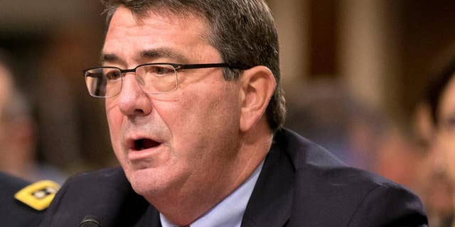 FILE - In this Feb. 12, 2013 file photo, Ashton Carter testifies on Capitol Hill in Washington. Carter has emerged as President Barack Obama's top candidate to become the next defense secretary, according to administration officials, putting him in line to take over a sprawling department that has had an uneasy relationship with the White House. (AP Photo/J. Scott Applewhite, File)
