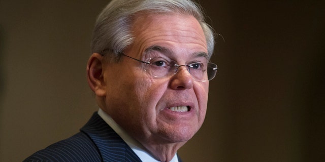 Sen. Bob Menendez, D-N.J., speaks to reporters during a news conference in Newark, N.. (AP Photo/John Minchillo)