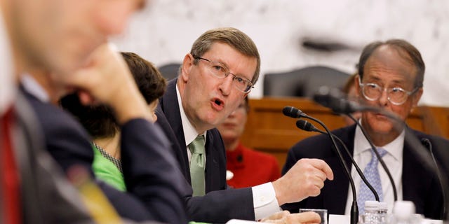 Dec. 1: Debt Commission member and Senate Budget Committee Chairman Sen. Kent Conrad, D-N.D., center, speaks during a meeting of the commission on Capitol Hill in Washington, D.C.