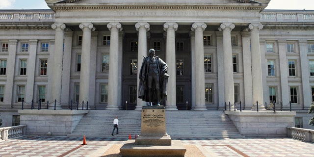 Aug. 8, 2011: A statue of former Treasury Secretary Albert Gallatin stands in front of the Department of the Treasury in Washington.