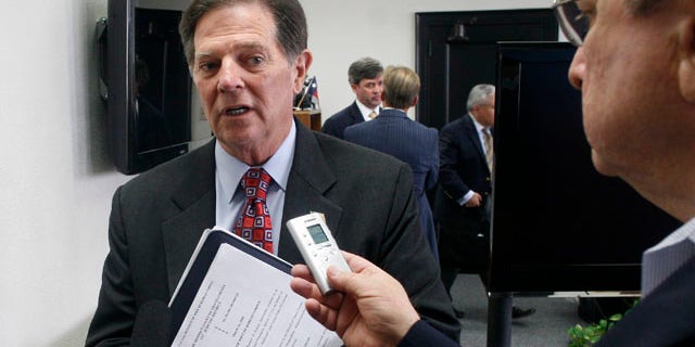 Oct. 26, 2010: Former House Majority Leader Tom Delay answers media questions during a break in jury selection for his money laundering and conspiracy trial.