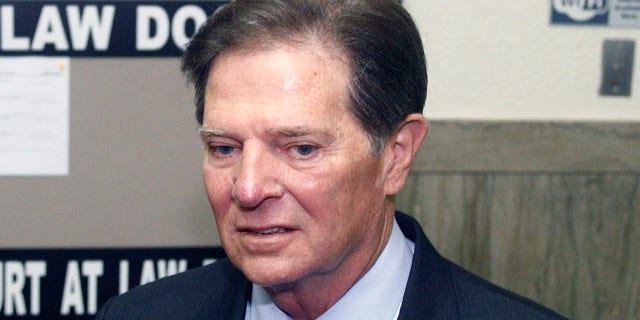 Oct. 26: Former House Majority Leader Tom DeLay shown here arriving at the Travis County courthouse in Austin, Texas for jury selection in his corruption trial.
