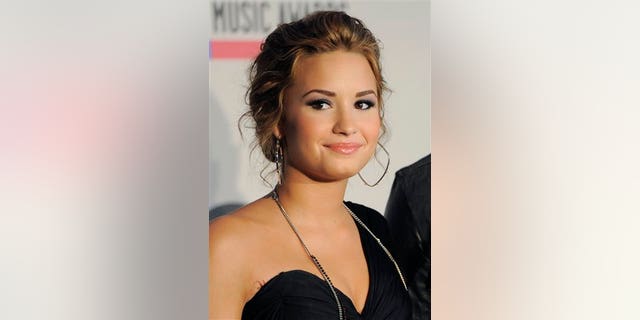 FILE - In this Oct. 12, 2010, Demi Lovato is pictured during nominations for the 2010 American Music Awards, in Los Angeles.   (AP Photo/Chris Pizzello)