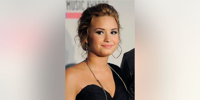 FILE - In this Oct. 12, 2010, Demi Lovato is pictured during nominations for the 2010 American Music Awards, in Los Angeles. (AP Photo/Chris Pizzello)