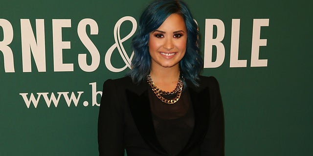 LOS ANGELES, CA - NOVEMBER 23: Demi Lovato arrives to a book signing at Barnes & Noble bookstore at The Grove on November 23, 2013 in Los Angeles, California. (Photo by Joe Scarnici/Getty Images)