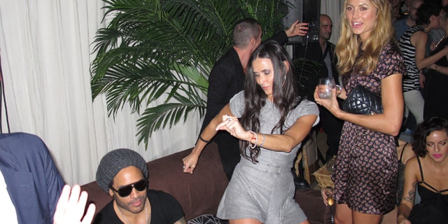 Demi Moore parties in Miami.