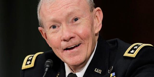 July 26: Army Gen. Martin Dempsey testifies on Capitol Hill in Washington before the Senate Armed Services Committee hearing on his nomination to become the next Joint Chiefs chairman.