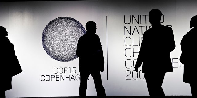 Journalists and participants at the main meeting venue on the second day of a UN Climate Summit in Copenhagen, Tuesday, Dec. 8, 2009.
