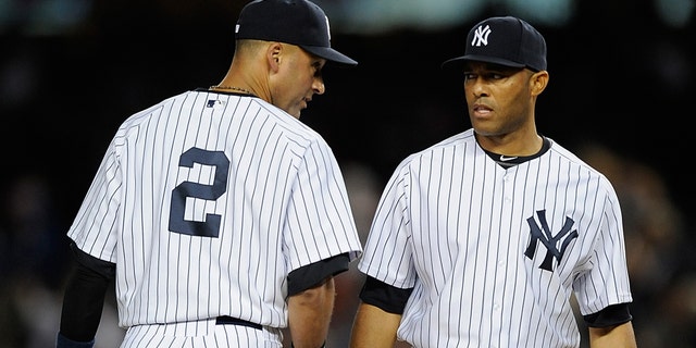 Rivera and Jeter during Game One against the Detroit Tigers on October 1, 2011 in New York City.