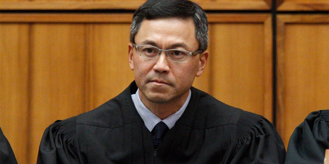 This December 2015 photo shows U.S. District Judge Derrick Watson in Honolulu. Hours before it was to take effect, President Donald Trump's revised travel ban was put on hold Wednesday, March 15, 2017, by Watson, a federal judge in Hawaii who questioned whether the administration was motivated by national security concerns. (George Lee/The Star-Advertiser via AP)