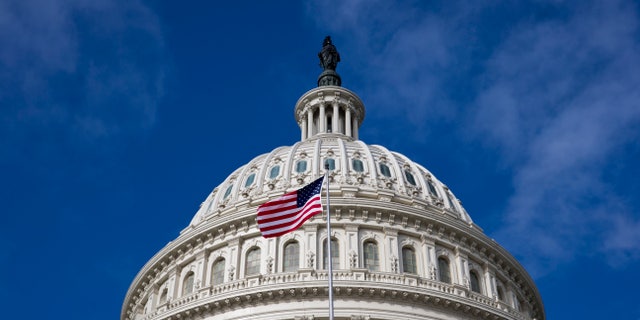 In this Oct. 14, 2013, photo, the U.S. Capitol is seen as a partial government shutdown enters its third week, in Washington. As talks between Republican and Democratic leaders lumber on in Washington, the American public sees an economic crisis looming if Congress is unable to raise the countrys debt ceiling. But the people seem just as conflicted on the issue as their elected representatives. (AP Photo/J. Scott Applewhite)