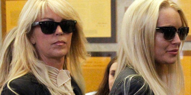 July 20: Actress Lindsay Lohan stands with her mother Dina Lohan.
