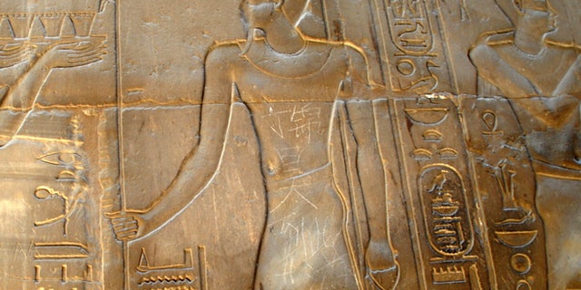 May 6, 2013: In this photo, the Chinese words "Ding Jinhao visited here" is seen on bas-relief in the 3,500-year-old Luxor temple in Luxor, Egypt.