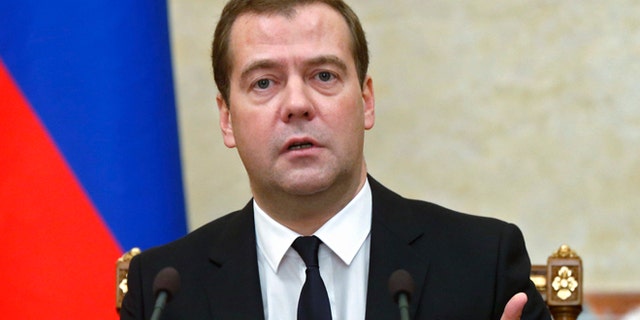 Aug. 7, 2014: Russian Premier Dmitry Medvedev announces sanctions at the Cabinet meeting in Moscow.