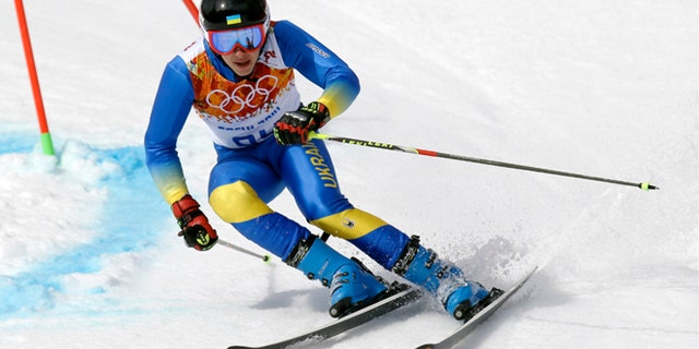 Feb. 19, 2014: Ukraine's Dmytro Mytsak passes a gate in the first run of the men's giant slalom at the Sochi 2014 Winter Olympics, Wednesday, in Krasnaya Polyana, Russia.