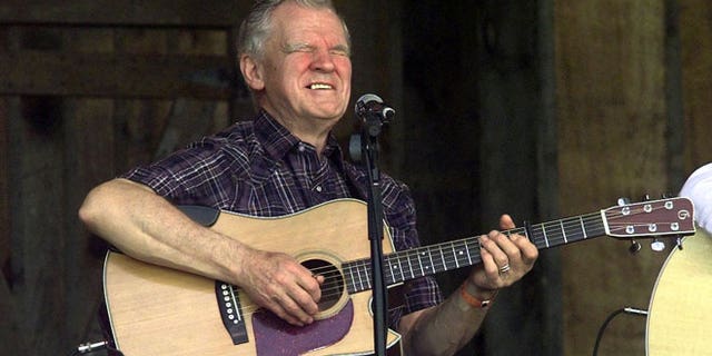 In this April 28, 2001 file photo, Music legend Doc Watson performs at the annual Merlefest at Wilkes Comunity College in Wilkesboro, N.C