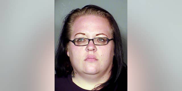 In this Monday, Feb. 23, 2015, booking photo provided Las Vegas Metropolitan Police Department shows suspect Jesse Vonstaden, 29, at the Clark County Detention Center in Las Vegas. Vonstaden faces felony charges including willful disregard for the safety of people and having dangerous or vicious dogs after police say four dogs she owns attacked two neighbors in a northeast Las Vegas neighborhood. Police say a 65-year-old woman was left with critical arm, leg and facial injuries, and a man suffered a severe hand injury. (AP Photo/Las Vegas Metropolitan Police Department)