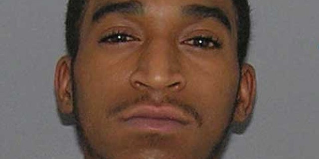 Dominic Gaines was arrested shortly after police say he posted a photo of himself holding his 1-year-old daughter and a BB gun.
