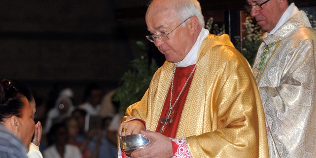 In this March 15, 2013, Archbishop Josef Wesolowski leads a Mass in Santo Domingo, Dominican Republic.