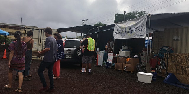 Residents gather to help and sort much-needed supplies at the Hawaii Island Donation Drive.