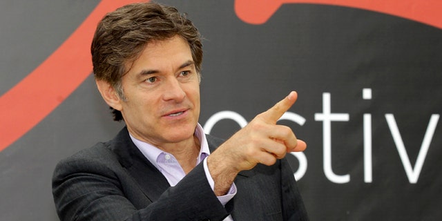 FILE - This June 13, 2012 file photo shows television personality Dr. Mehmet Oz during a photocall at the 2012 Monte Carlo Television Festival in Monaco. On Tuesday, Aug. 20, 2013, Oz rushed to an accident scene after a yellow cab jumped the curb and struck a pedestrian outside New York's  Rockefeller Center. Oz says in a statement that emergency medical crews were already treating the injured woman who had a bad leg wound. He says a good Samaritan made a tourniquet out of a belt for the woman.   (AP Photo/Lionel Cironneau, File)