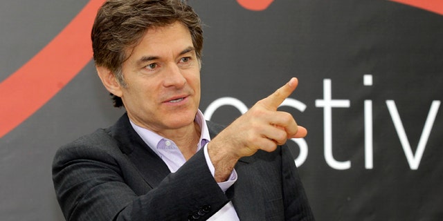 FILE - This June 13, 2012 file photo shows television personality Dr. Mehmet Oz during a photocall at the 2012 Monte Carlo Television Festival in Monaco. On Tuesday, Aug. 20, 2013, Oz rushed to an accident scene after a yellow cab jumped the curb and struck a pedestrian outside New York's Rockefeller Center. Oz says in a statement that emergency medical crews were already treating the injured woman who had a bad leg wound. He says a good Samaritan made a tourniquet out of a belt for the woman. (AP Photo/Lionel Cironneau, File)