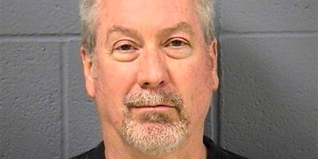 July 23, 2012: In this May 7, 2009 file booking photo provided by the Will County Sheriff's office in Joliet, Ill., former Bolingbrook, Ill., police sergeant Drew Peterson is shown.