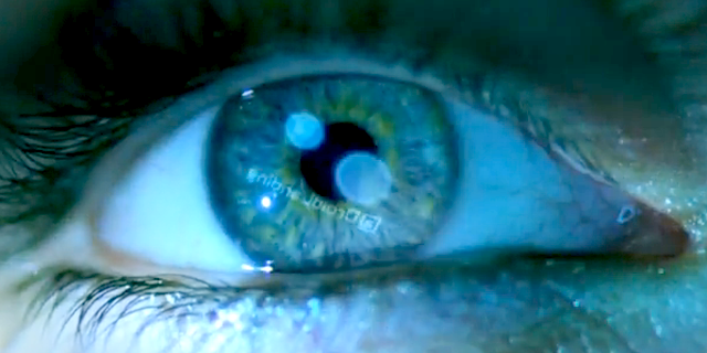 A screen shot from a Verizion ad for its latest phoen shows the backwards reflection of @DroidLanding -- a secret Twitter account.