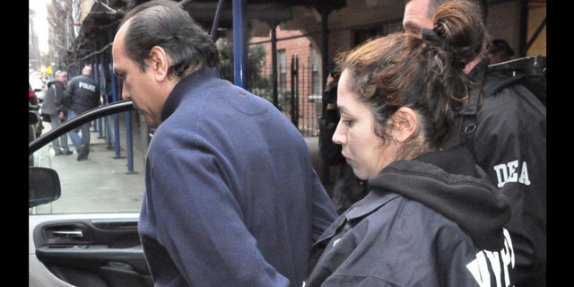 Dr. Hector Castro being arrested.