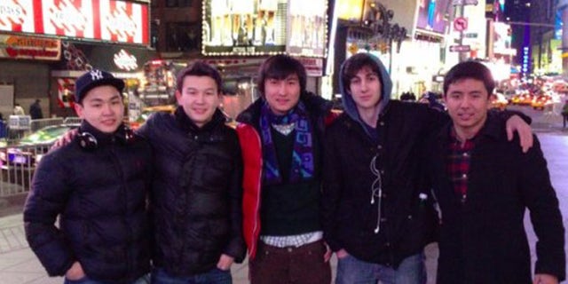 Dzhokhar Tsarnaev and older brother Tamerlan reportedly planned to drive to NYC after their deadly Boston attack to detonate devices in Times Square, which Dzhokhar visited earlier with friends. None of the others pictured here are suspected of being involved in the Tsarnaevs’ plot. Dias Kadyrbayev is standing left of Dzhokhar's right in the blue scarf, and Azamat Tazhayakov is immediately left of Kadyrbayev.