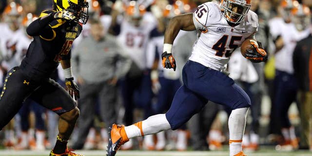 ADVANCE FOR WEEKEND EDITIONS, JUNE 1-2 - FILE - In this Nov. 9, 2013 file photo, Syracuse running back Jerome Smith, right, outruns Maryland defensive back A.J. Hendy as he scores a touchdown in the second half of an NCAA college football game in College Park, Md. Out of a record 102 early entrants in this years NFL Draft, 39 went undrafted. Fortunately 33 of those wound up with NFL tryouts. “I waited all day on graduation day for the call,” Syracuse running back Jerome Smith said. “It didn't happen.” Then the Falcons called after the draft. (AP Photo/Patrick Semansky, File)